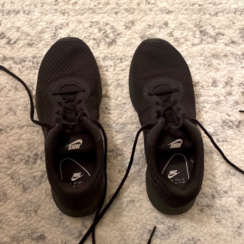 Black Nike running shoes